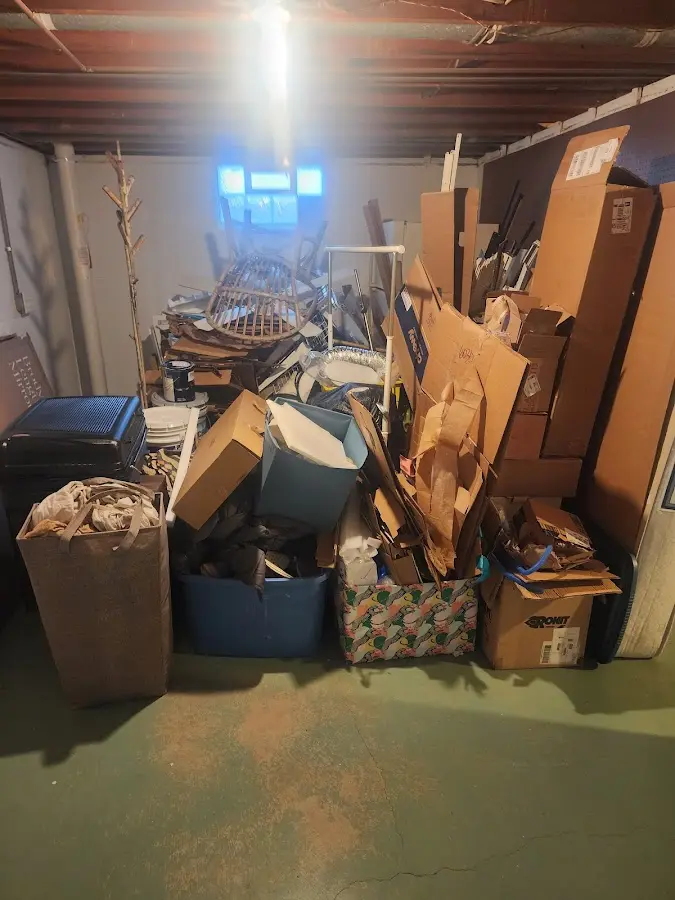 Roll-off dumpster container at job site for 2 Yard Dumpster Rental in Plumas Lake